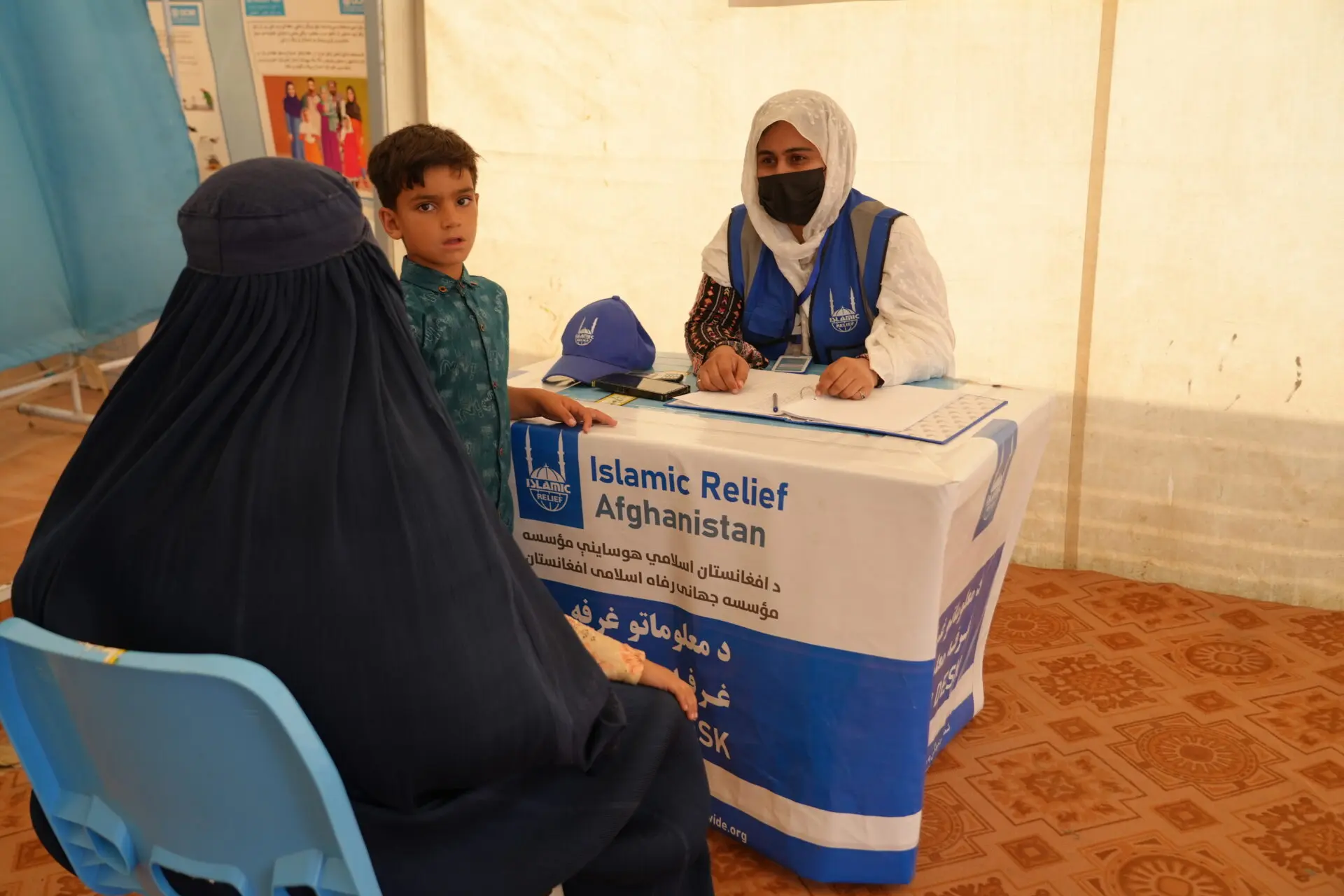 Laila Mohammadi supports new arrivals by explaining what services they can access through Islamic Relief and our partners