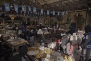 Children waiting for the iftar to open with their guardians/parents