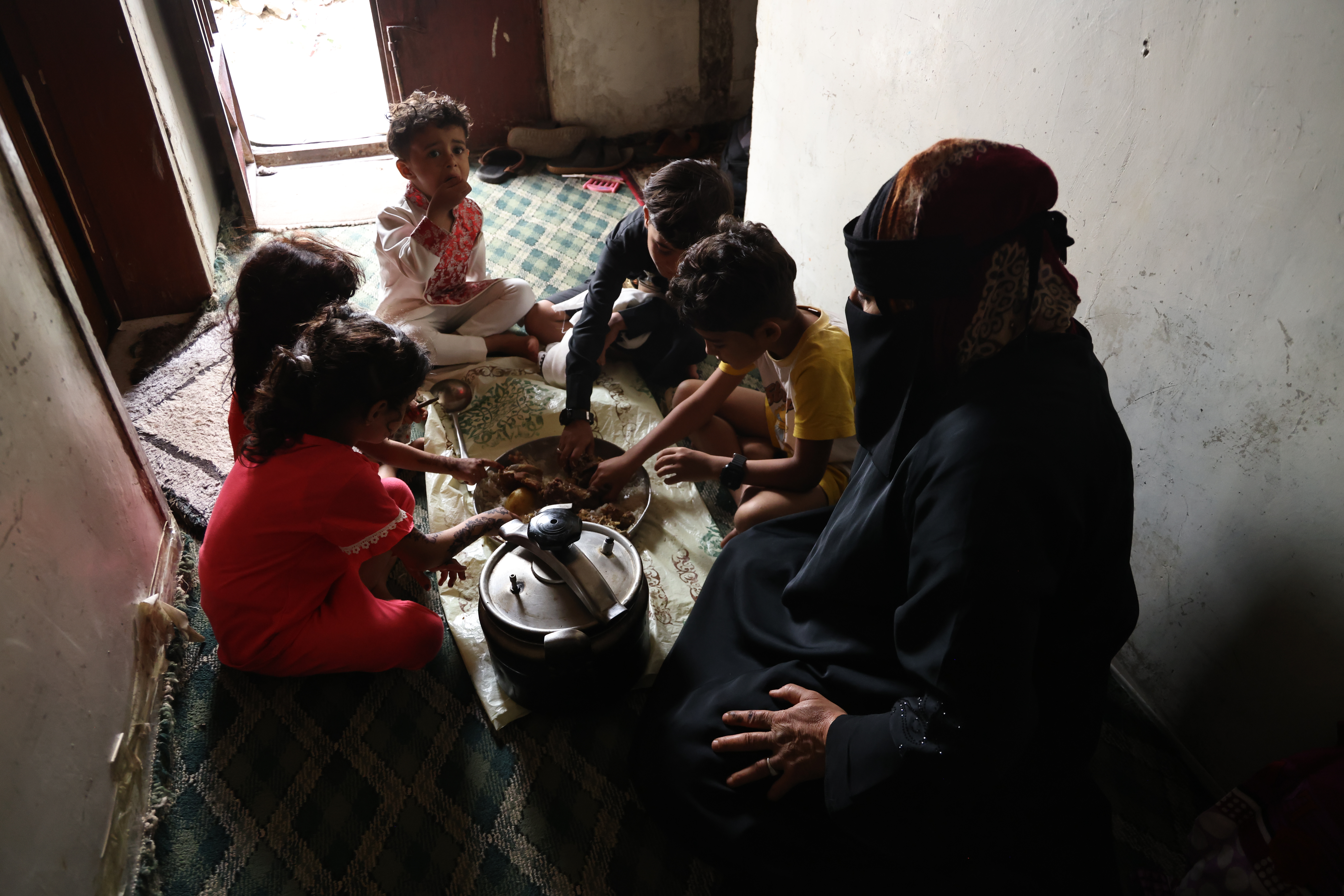 Family enjoying qurbani meat from Islamic Relief
