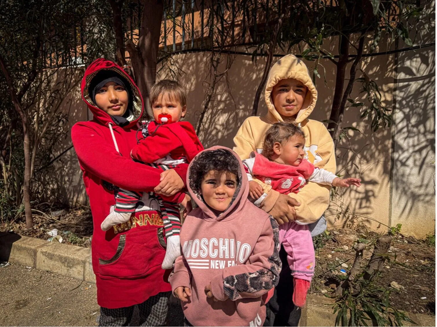 Children from a displaced family in Lebanon, 2026