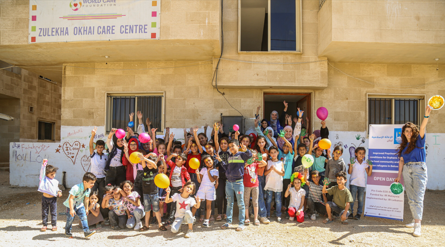 Farah (far right) with children supported by Islamic Relief in Lebanon