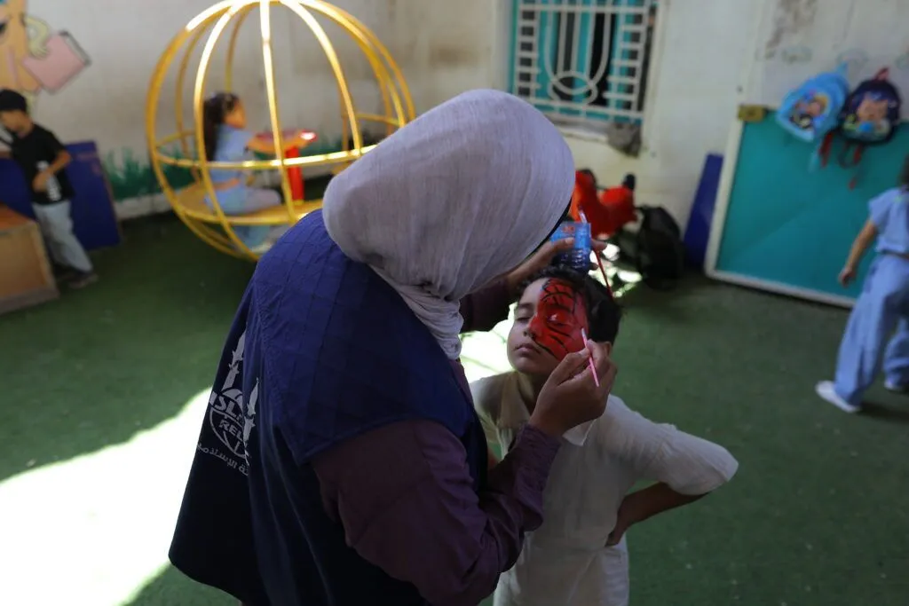 Children enjoy a moment of respite at one of the temporary learning centres supported by Islamic Relief